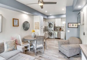 Modern kitchen with stainless steel appliances and white cabinetry in Newbury Park executive rental